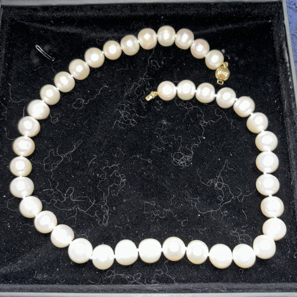Beautiful large genuine pearl necklace with gold clasp.